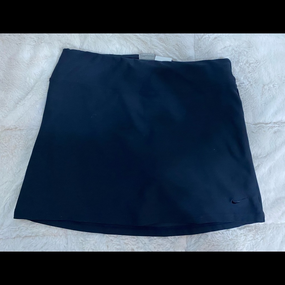 Nike ladies XS navy skort/ tennis skirt. GUC